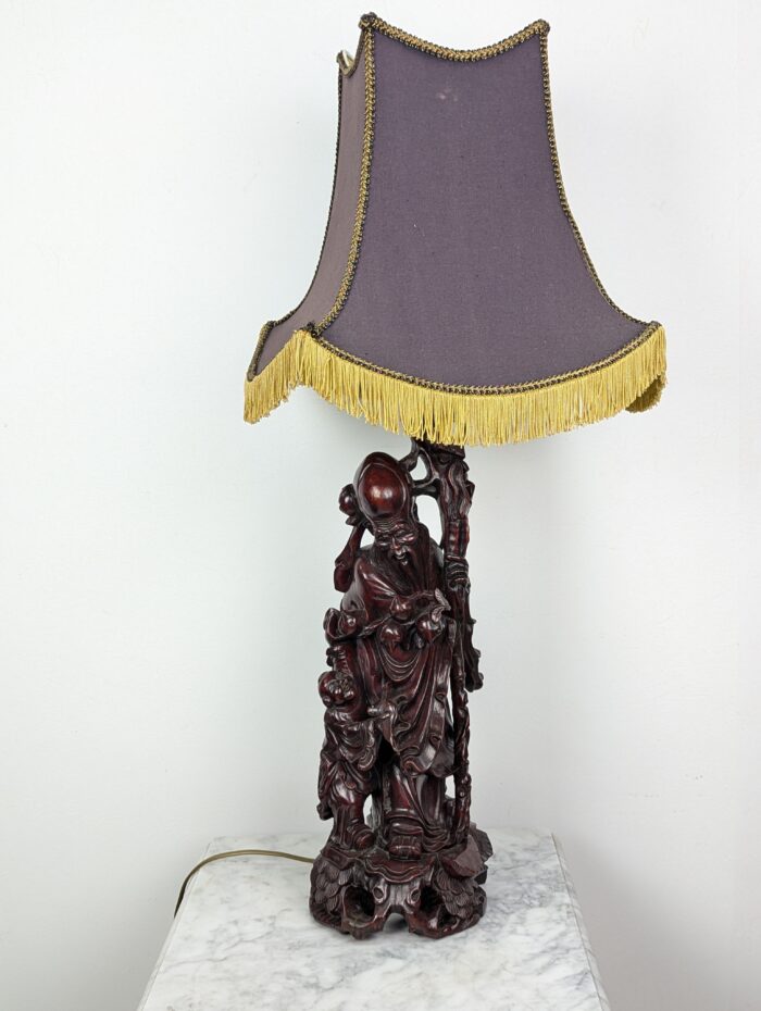 Carved rosewood oriental table lamp