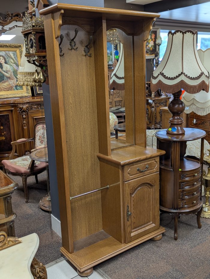 Hallway cabinet with mirror and clothes hangers